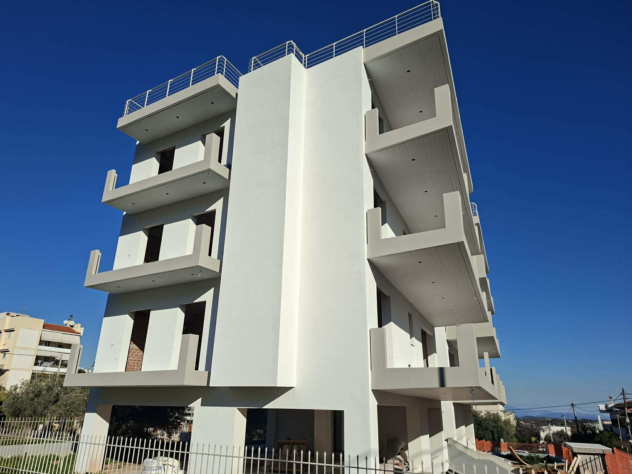 Θερμοπρόσοψη πολυκατοικίας στην Αθήνα από την AtticaBuilders